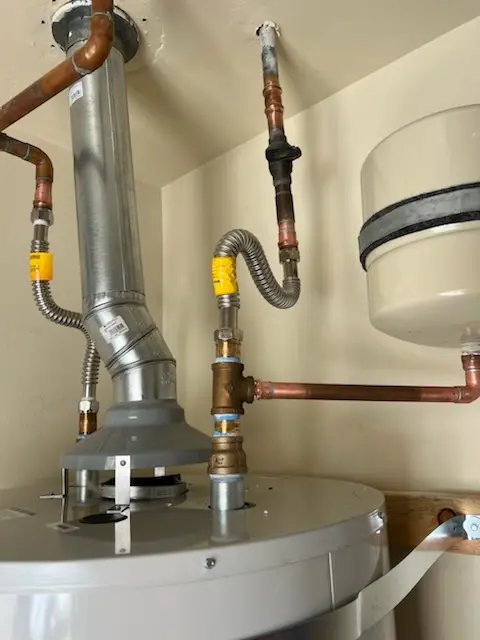Water heater installation and plumbing repair in Poquott